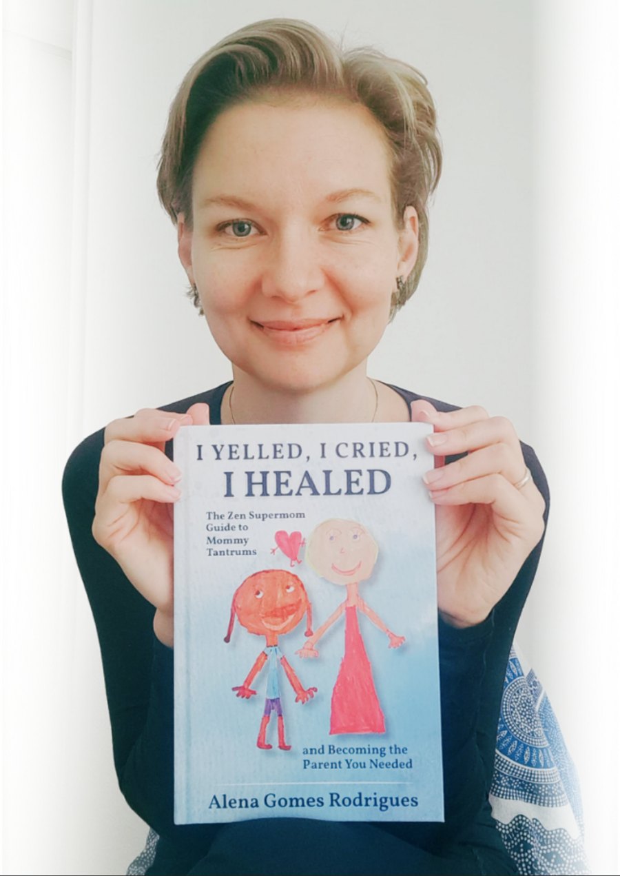 Alena Gomes Rodrigues holding her book I Yelled, I Cried, I Healed
